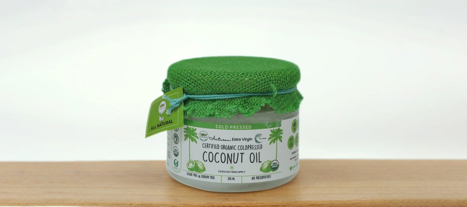 Cold pressed organic coconut oil mid front D