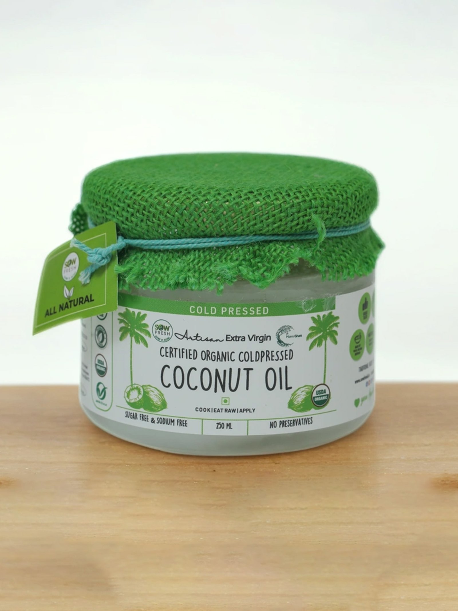 Cold pressed organic coconut oil mid front M